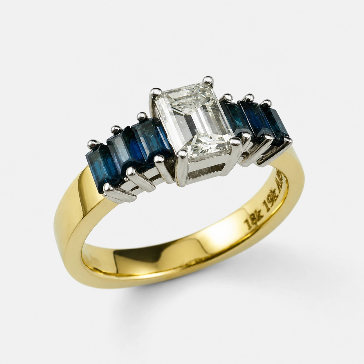 18K Yellow and 19K White Gold Emerald Cut and Baguette Cut Sapphire Ring