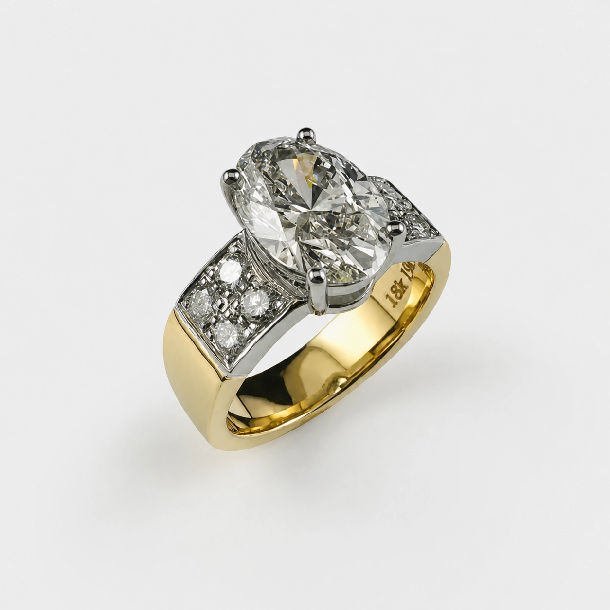 18K Yellow and 19K White Gold Oval Brilliant Diamond Ring