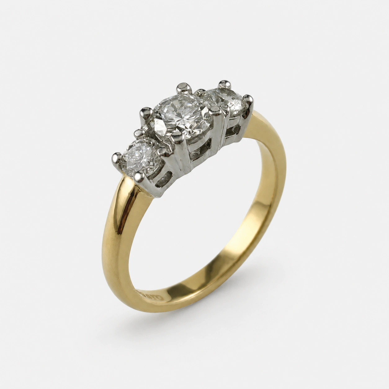 19K White and 18K Yellow Gold Three Diamond Ring