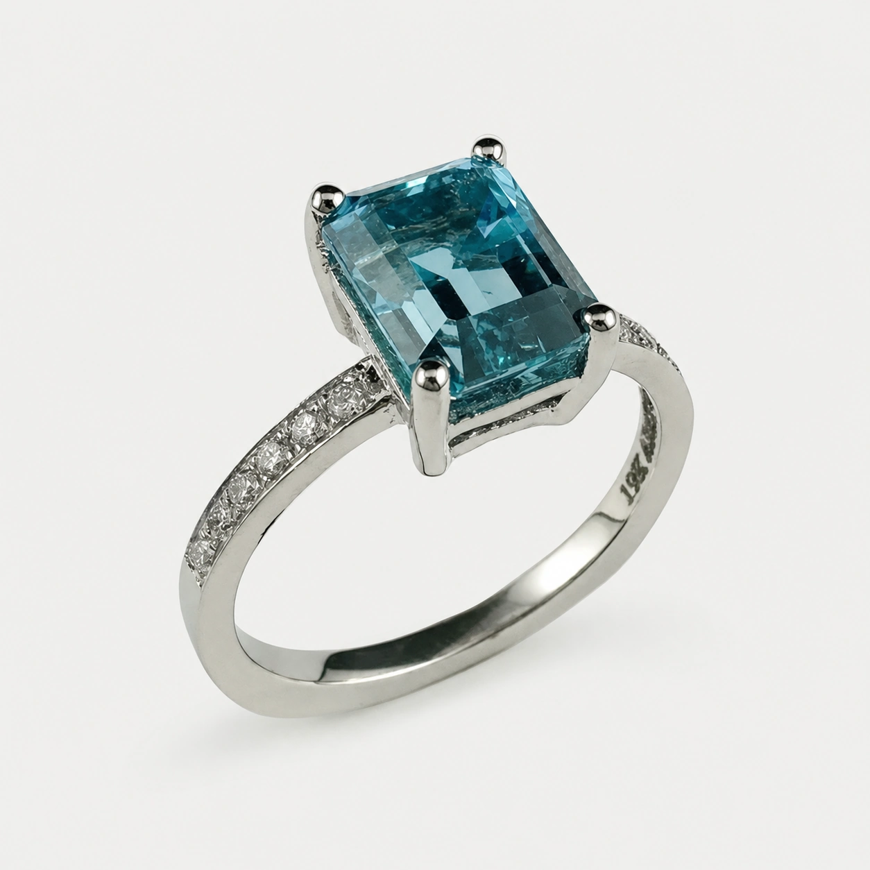 19K White Gold Blue Topaz and Diamond Ring