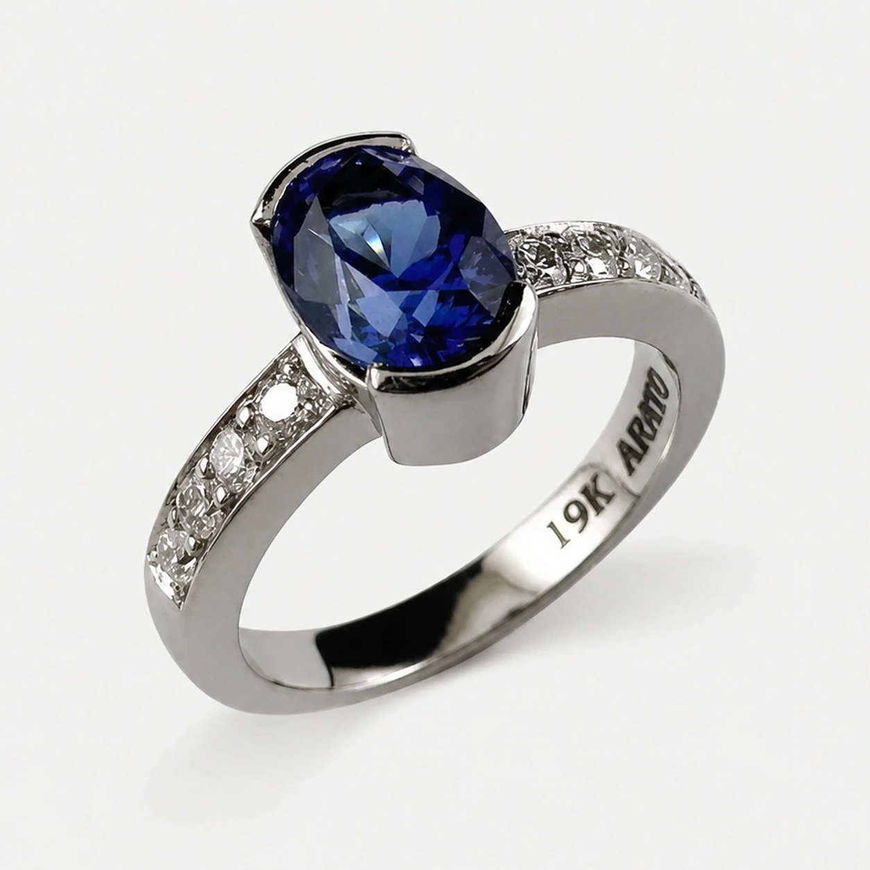 19K White Gold Tanzanite 26 Diamond Ring
