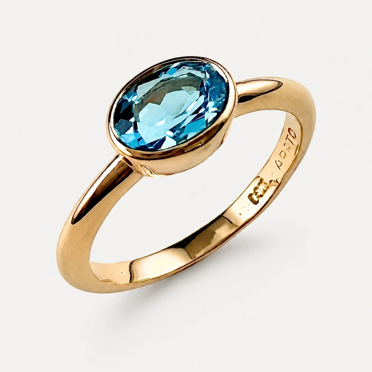 14K Rose Gold Blue Topaz Ring