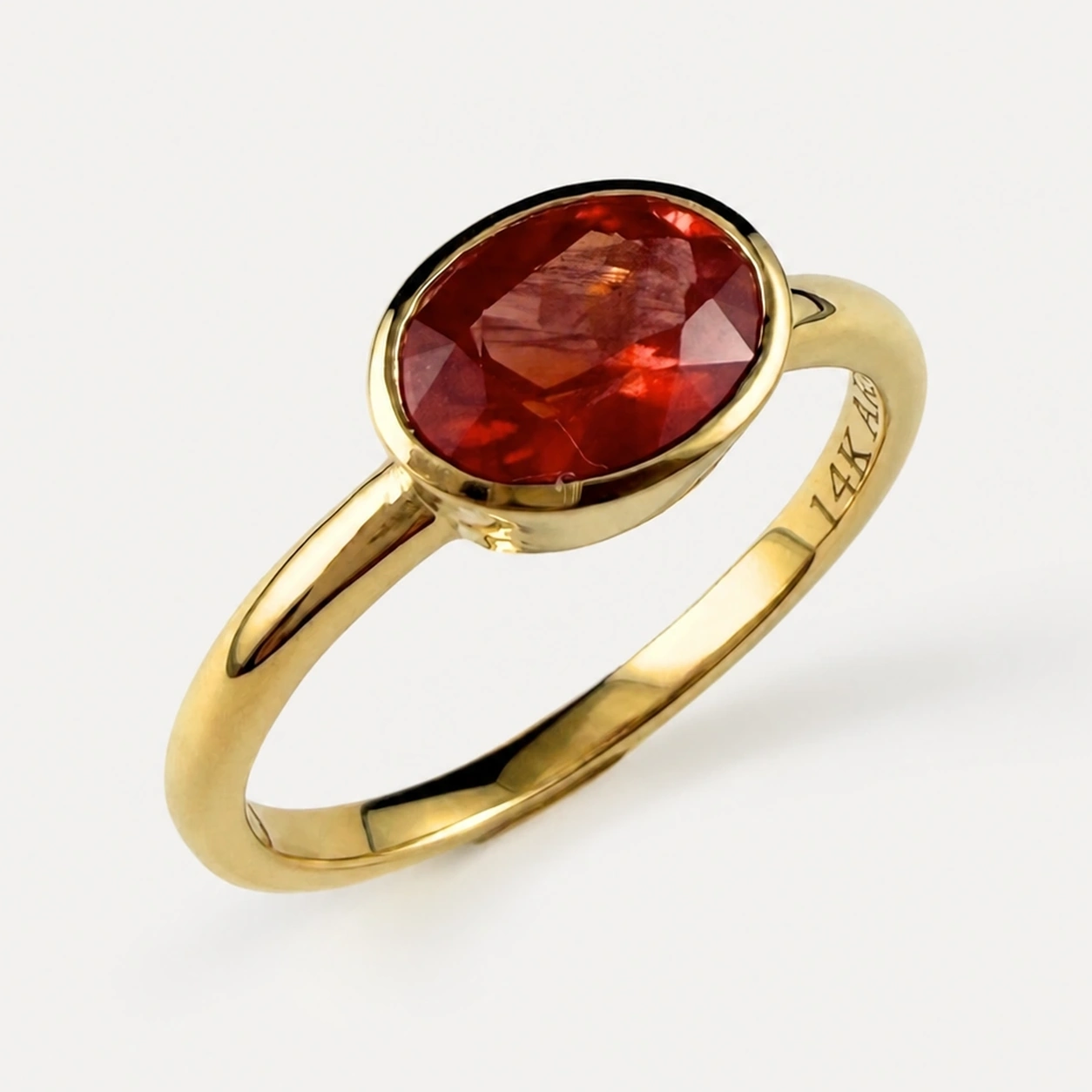 14K Yellow Gold Bezel Set Orange Sapphire Ring