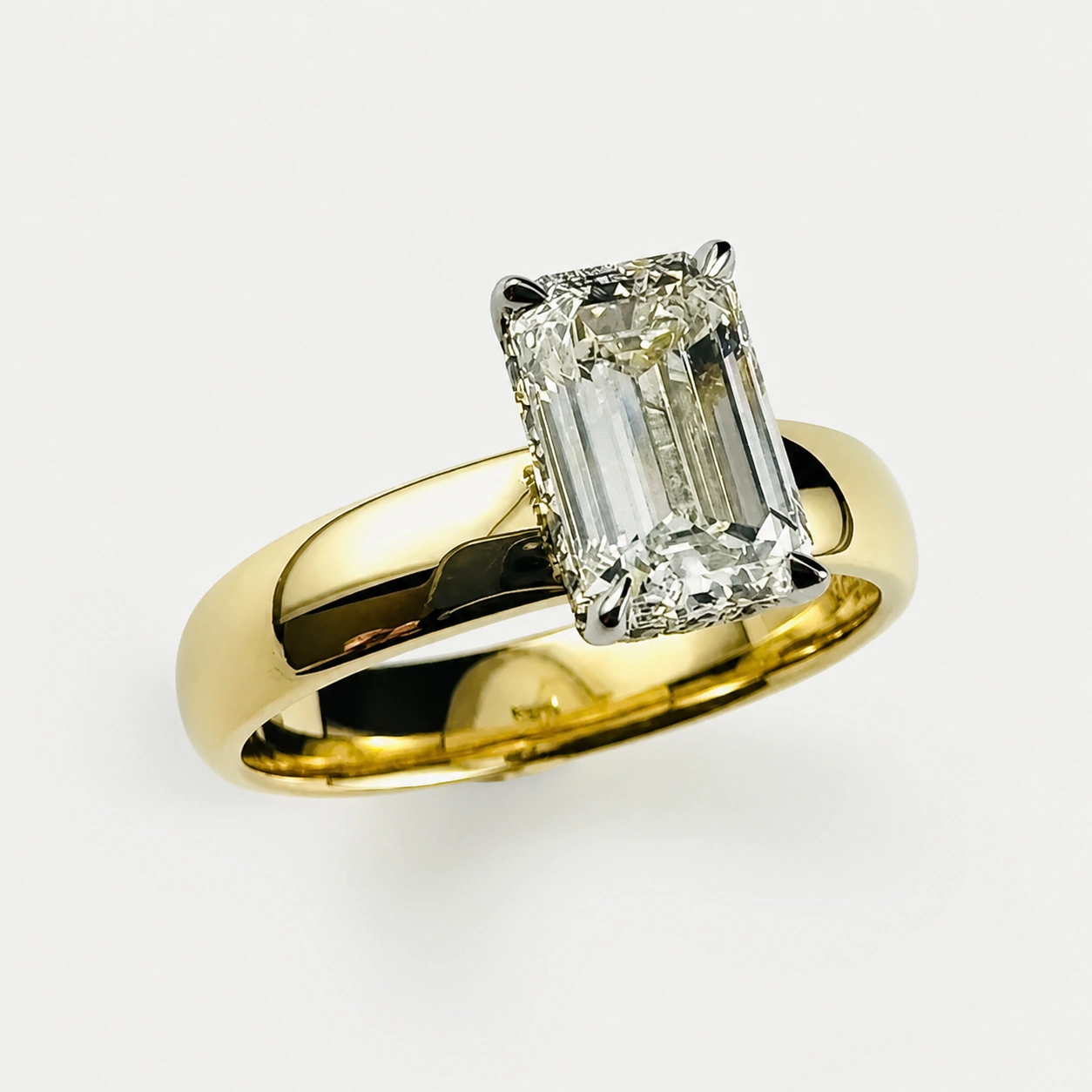 18K Yellow and 19K White Gold Emerald Cut Diamond Hidden Halo Ring