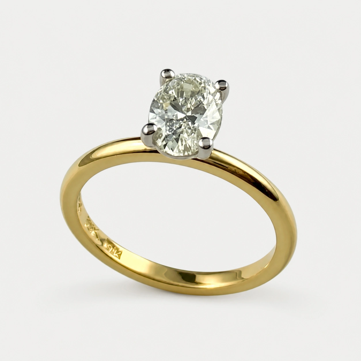 19K White and 18K Yellow Gold Oval Brilliant Cut Diamond Solitaire